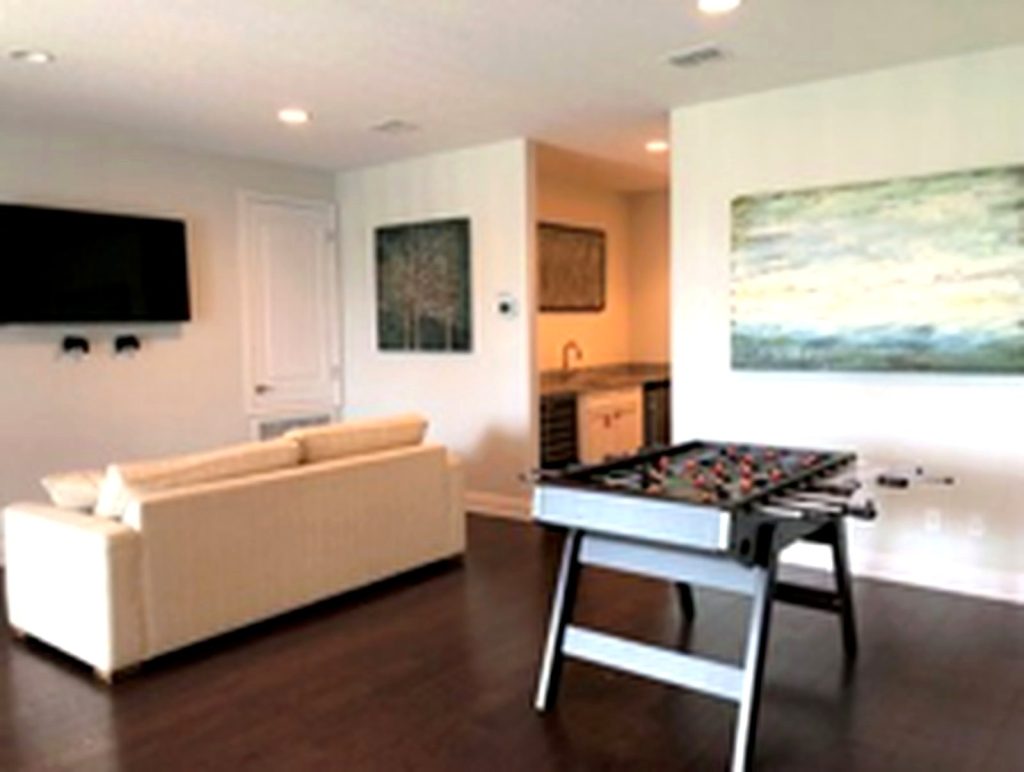 golfers-castle-reunion-resort-holeinonehouses-Game-Room-and-Lounge